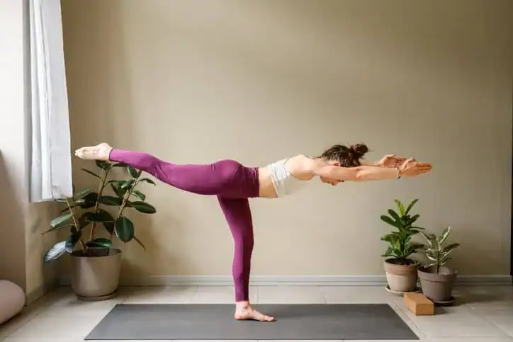 Achieving the Perfect Tone: How Often Should You Exercise for Results? 1 Woman doing Yoga exercise Herne to help with toning the body.